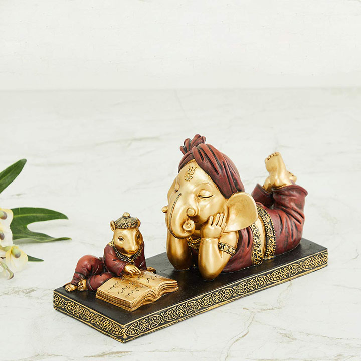 home centre alpana ganesha with mouse figurine