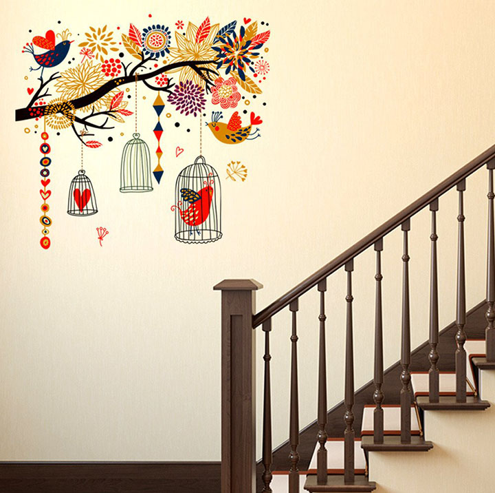 branch with elements of bird and cage wall sticker
